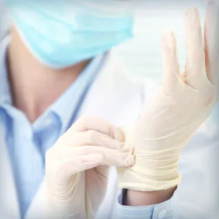 doctor wearing latex gloves